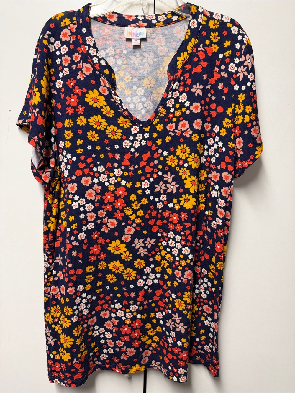 LuLaRoe Layla Mandarin Split Collar .  Navy Floral  Top with Yellow, Red flowers
